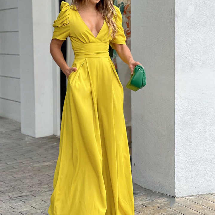 Stilla | Elegant V-udskæring Jumpsuit med puf ærmer til stilfulde kvinder