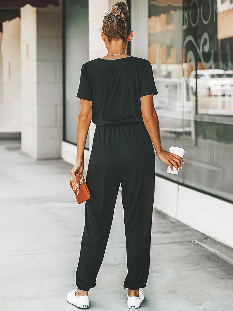 Stilla | Korte ærmer jumpsuit med V-udskæring