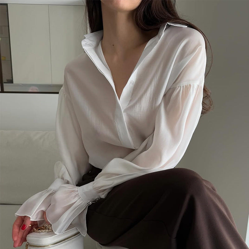 Dame Elegant Bluse med voluminøse Puffærmer og fint Strukturdesign Stilla