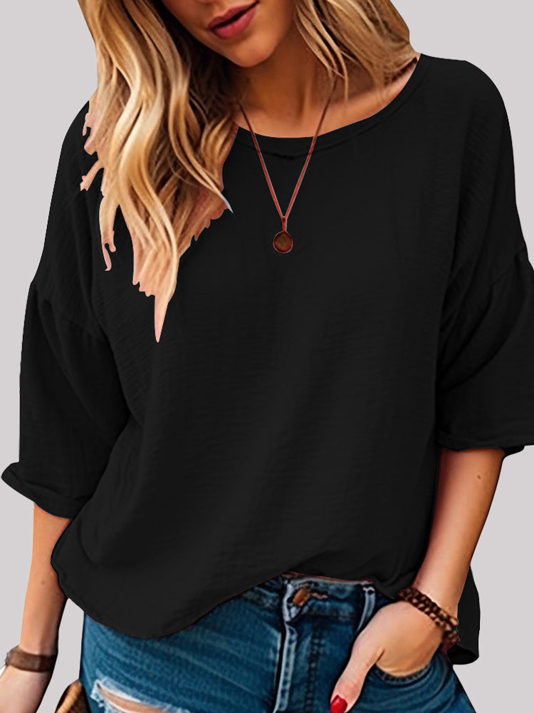 Dame afslappet longsleeve overdel med minimalistisk struktur og løs pasform Stilla