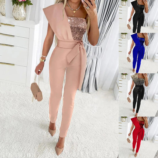 Dame elegant jumpsuit med asymmetrisk snit og glitrende overdel Stilla