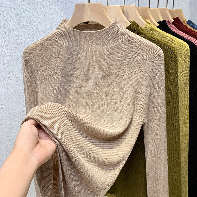 Dame pullover med høj ståkrave og fin ribstruktur Stilla