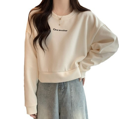 Dame Cropped Graphic Pullover Sweatshirt med Statement-print Stilla