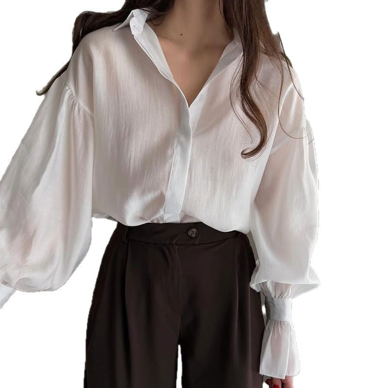 Dame Elegant Bluse med voluminøse Puffærmer og fint Strukturdesign Stilla