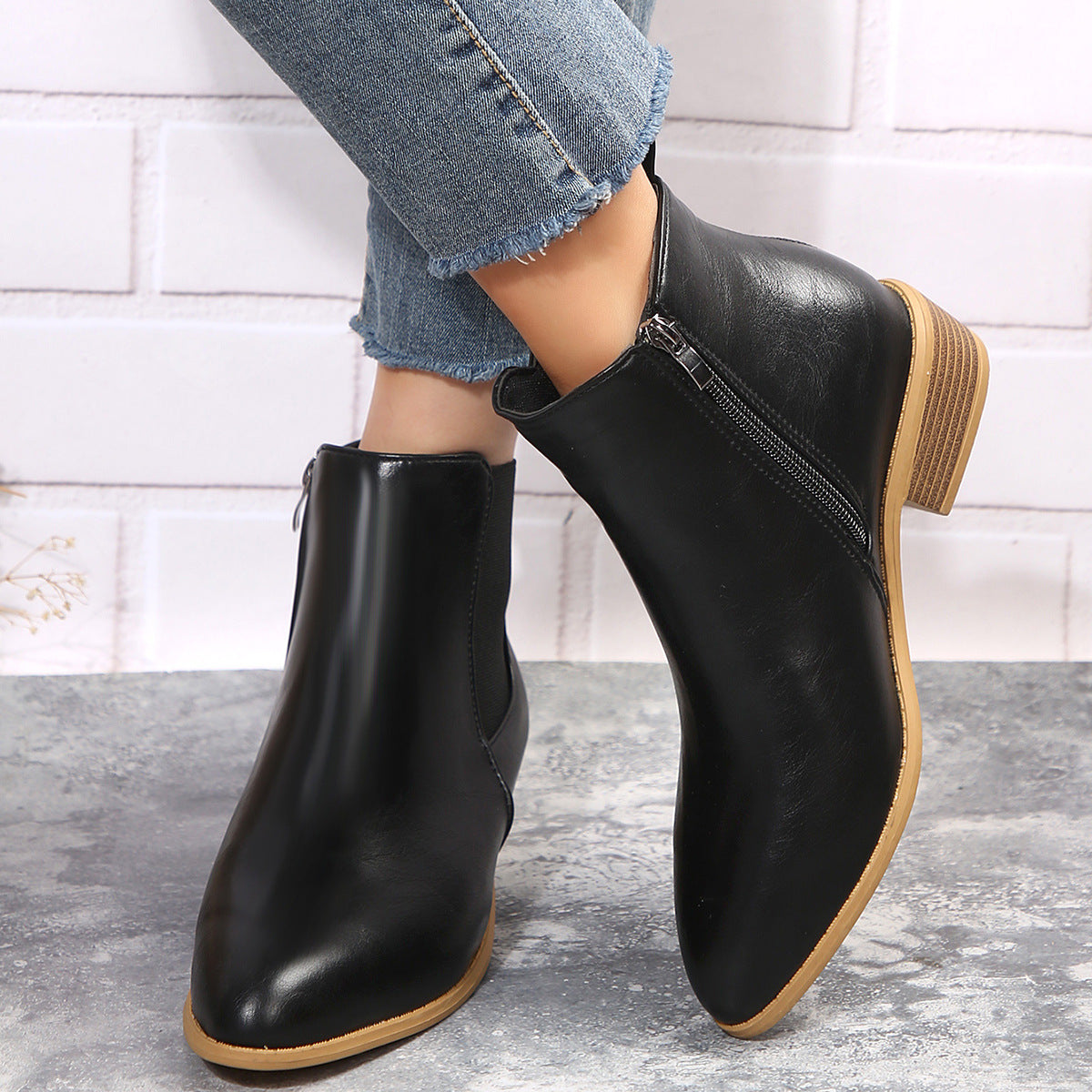 Dame ankle boots med elegant lynlås og glat overflade Stilla