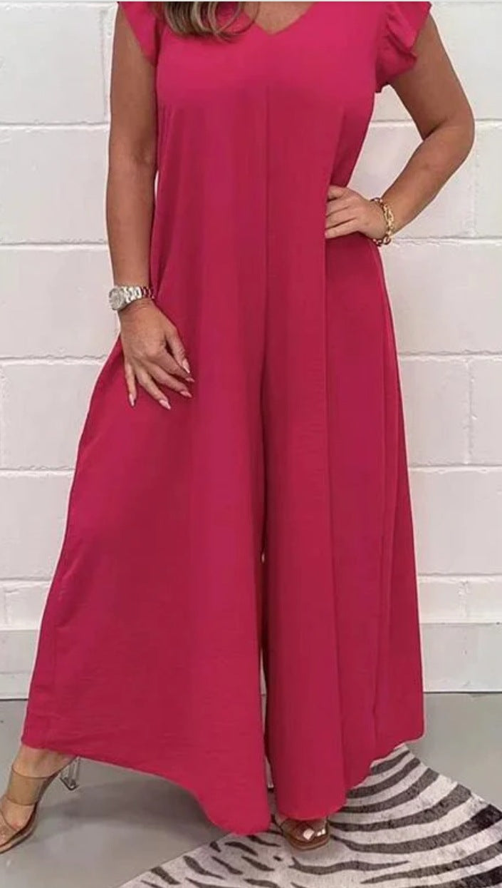 Dame jumpsuit med voluminøse ben og elegant V-udskæring Stilla