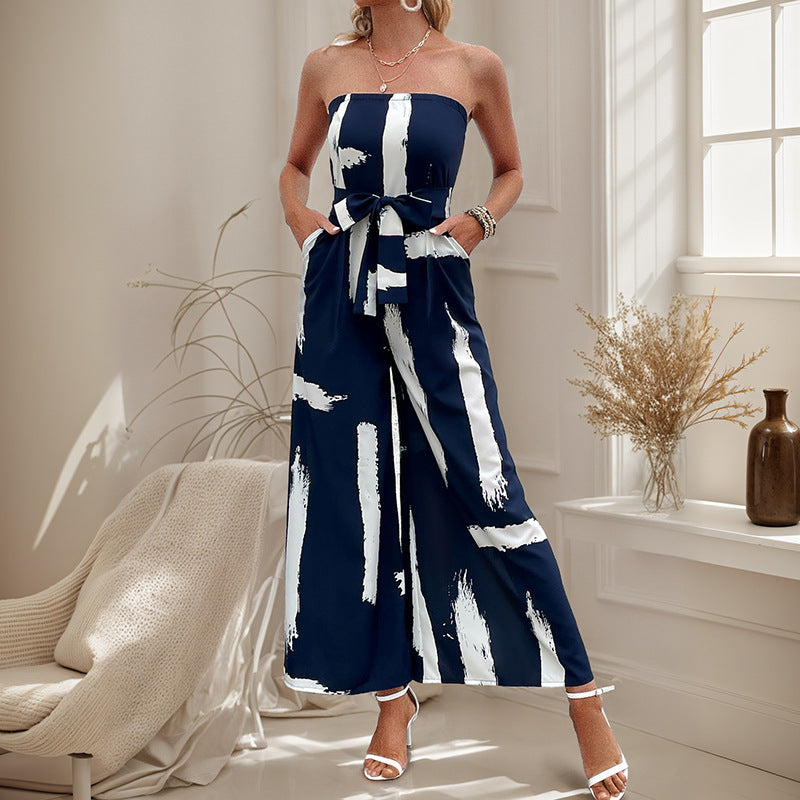 Dame stropløs jumpsuit med bred ben og figursyet bælte Stilla
