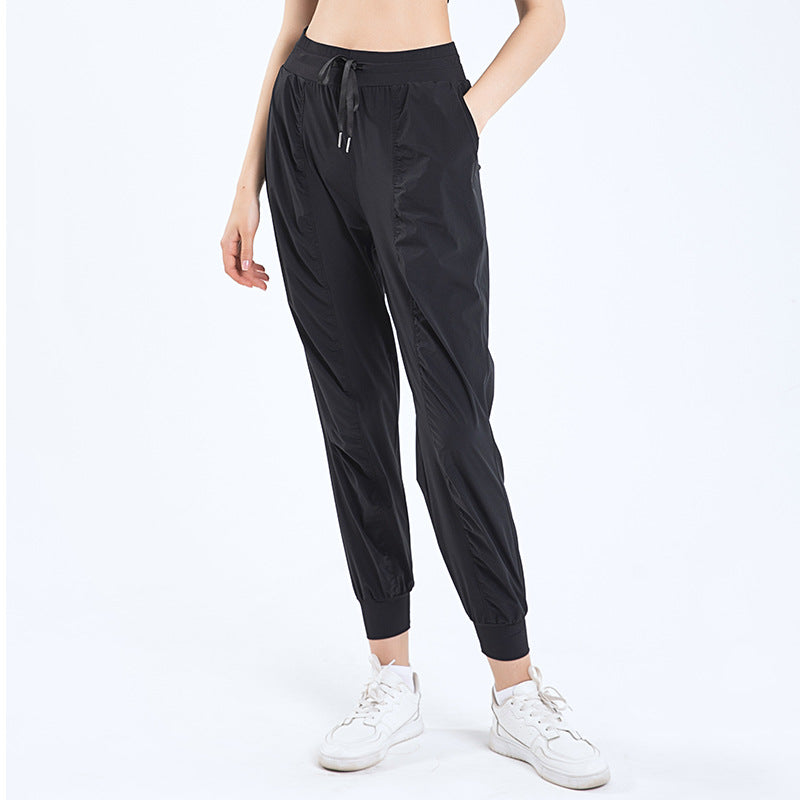 Dame afslappet sportbukser med elastisk talje og sidelommer med lynlås Stilla