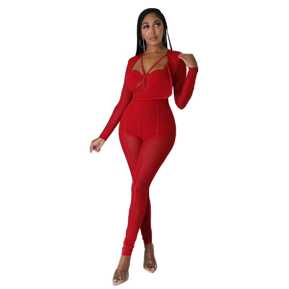 Dame figurtilpasset jumpsuit med innovative cut-out-designs og gennemsigtig stofstruktur Stilla
