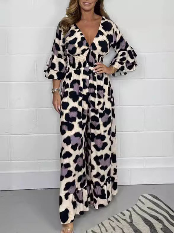 Dame Maxijumpsuit med elegant V-udskæring og flæseærmer Stilla