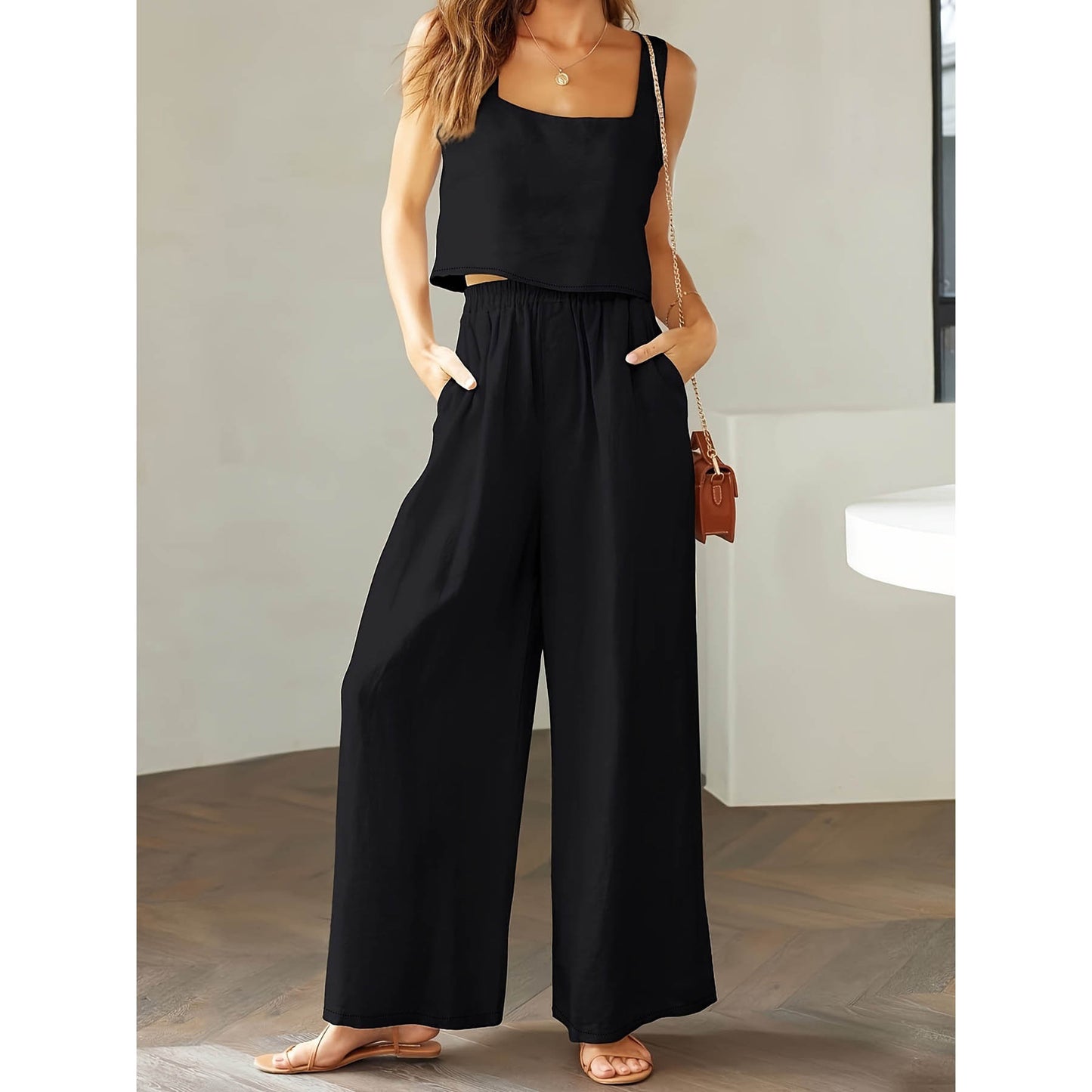 Dame jumpsuit med brede ben og praktiske lommer Stilla
