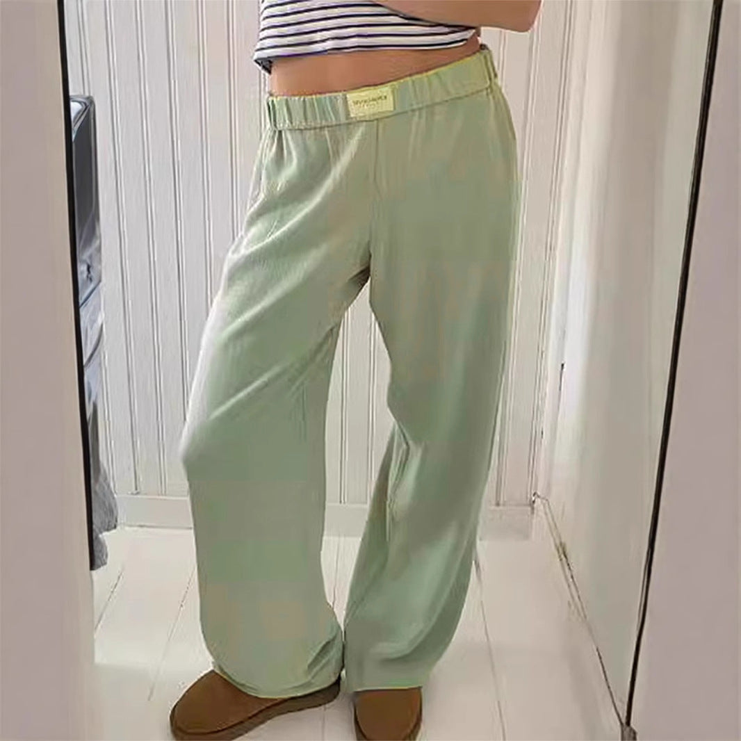 Dame afslappede Palazzo-bukser lavet af let, åndbart stof med elastisk talje Stilla