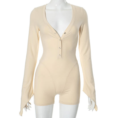 Dame langærmet bodysuit med elegant V-udskæring og knapdetaljer Stilla