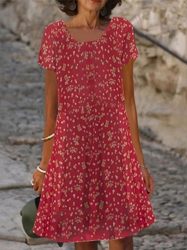 Dame afslappet halværmet kjole med blomstermønster og flatterende snit Stilla