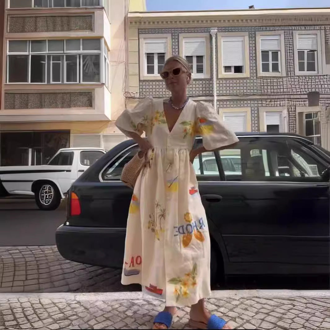 Dame afslappet maxikjole med blomstertryk og knapdetaljer Stilla