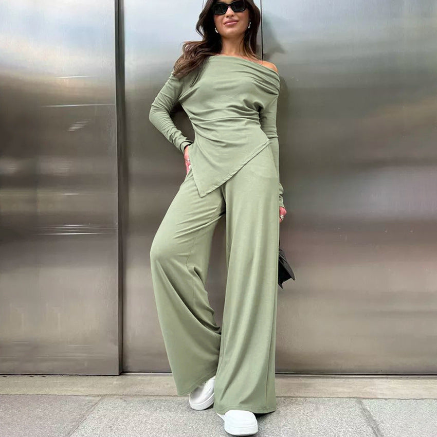 Dame jumpsuit med off-shoulder design og elegant draperet stof Stilla