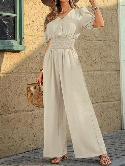 Dame jumpsuit med elastisk talje og knapdetalje Stilla