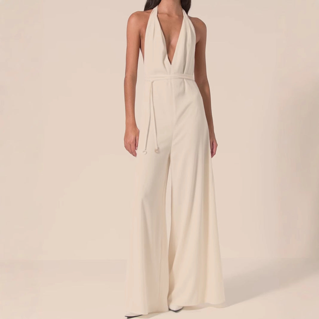 Dame jumpsuit med dyb V-udskæring og bredt ben Stilla