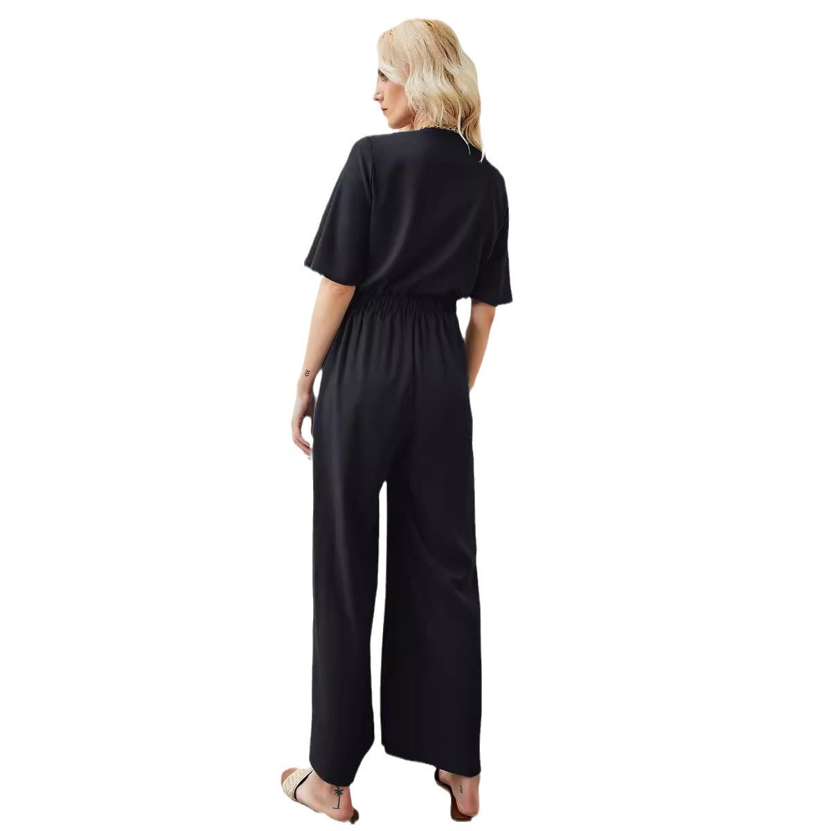 Dame stilfuld fritids-jumpsuit med dekorativt knudedesign og brede bukseben Stilla