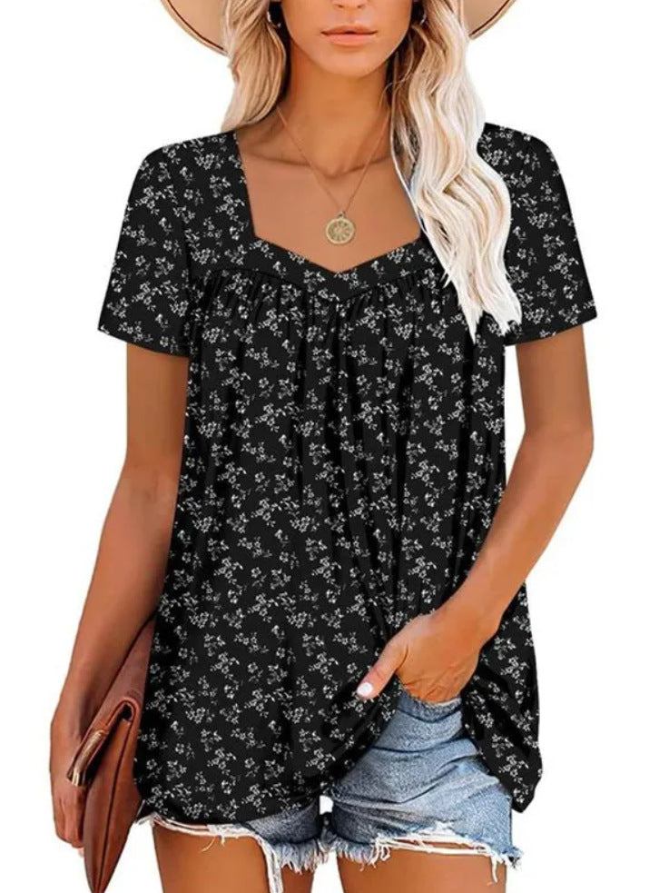 Dame afslappet blomster-top med V-hals og løs pasform Stilla