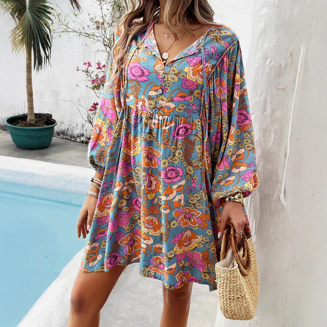 Dame afslappet blomsterprint kjole med dyb V-udskæring og bredt skårne ærmer Stilla