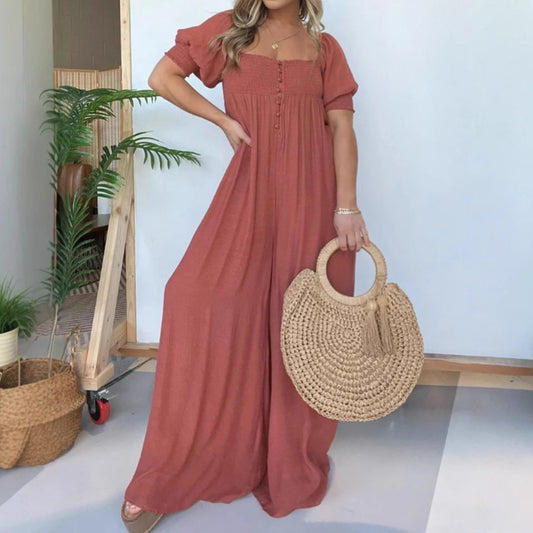 Dame afslappet jumpsuit med smalle stropper og knapdetalje Stilla