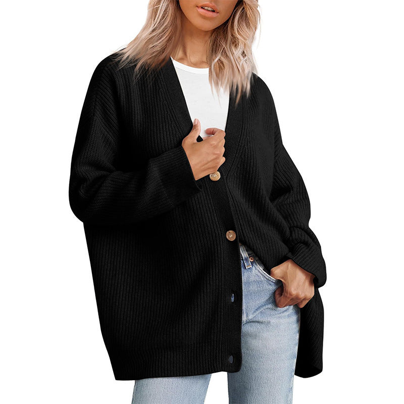 Dame strikjakke med oversized snit og knapdetaljer Stilla