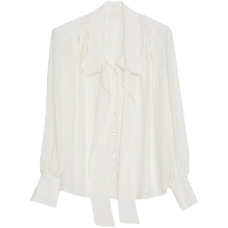 Dame elegant bluse med sidelæns bindebånd og raffineret knapliste Stilla