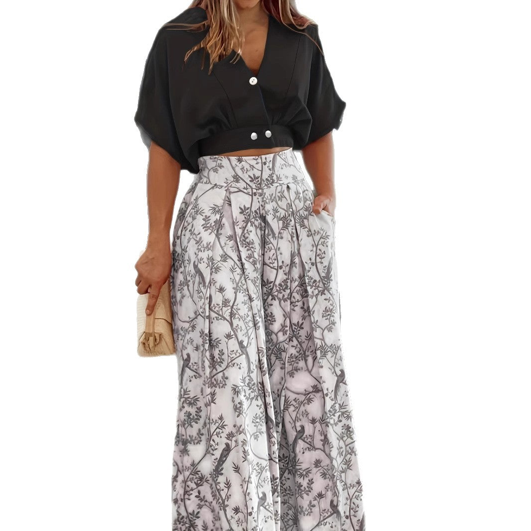 Dame elegant crop-top med knapdetaljer og maxiskirt med blomsterprint Stilla