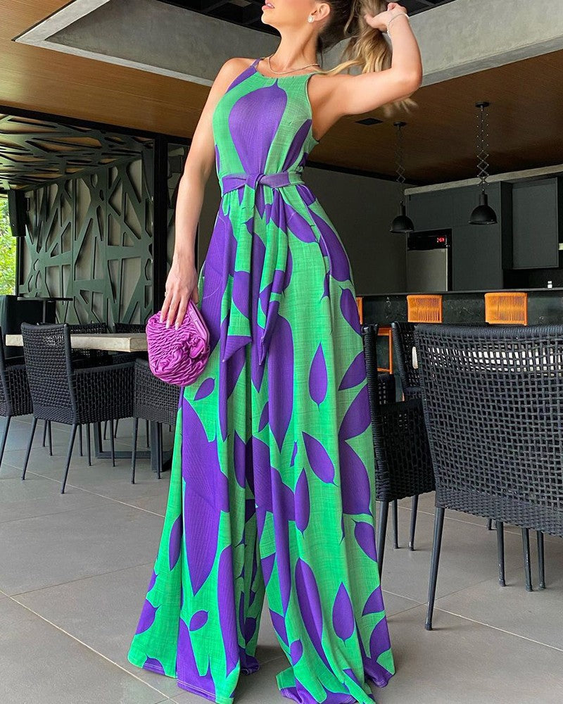Dame jumpsuit med floral design og bred ben Stilla