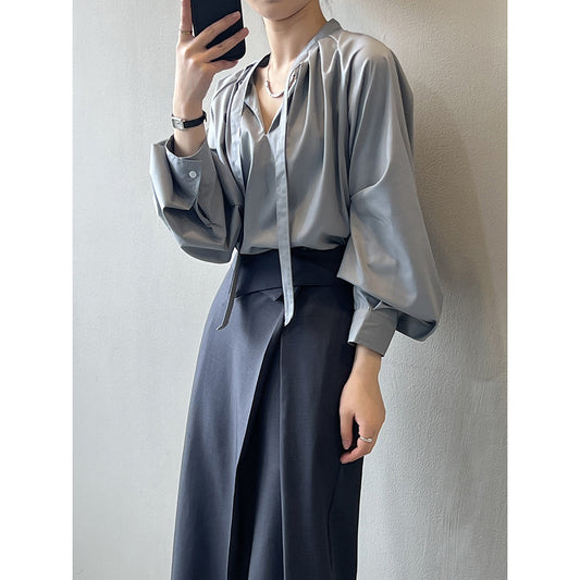 Dame elegant blouse med sløjfedetalje og fint satin-finish Stilla