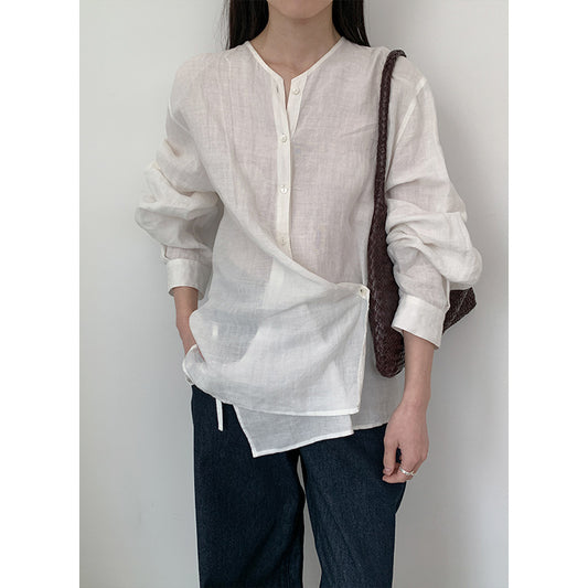 Dame afslappet skjorte med innovativ knaplukning og asymmetrisk kant Stilla