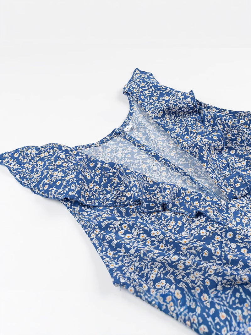 Dame jumpsuit med legende flæse-design og blomstermønster Stilla