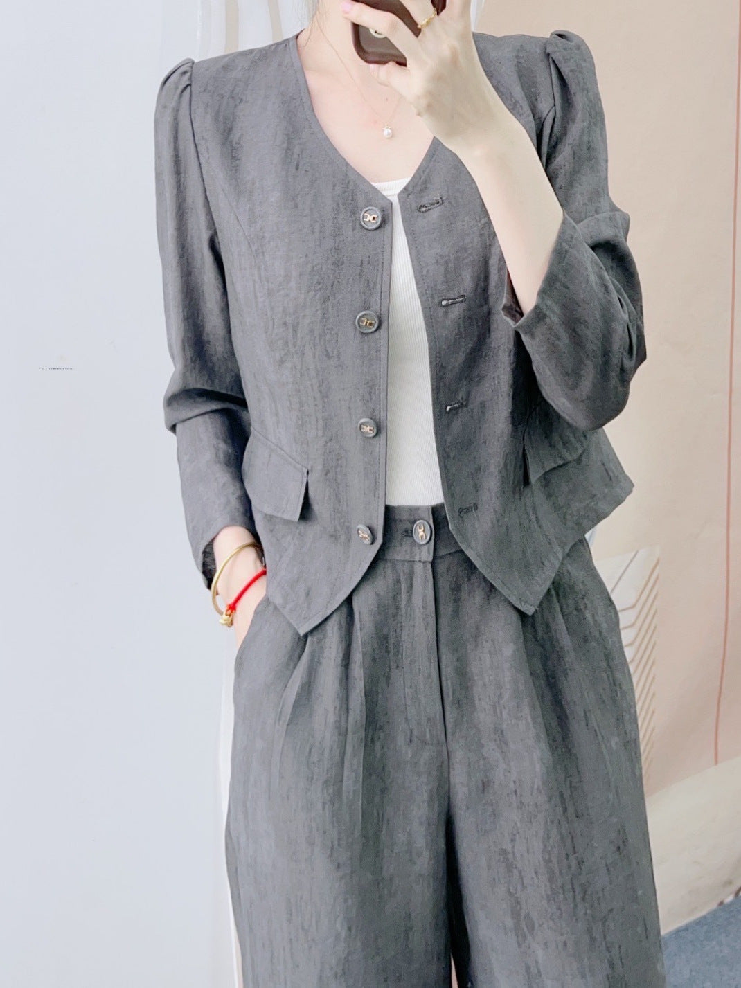 Dame elegant blazer-bukser-sæt med høj talje og struktureret design Stilla