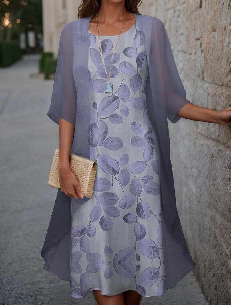 Dame elegant fritidskjole med asymmetrisk kant og floral design Stilla