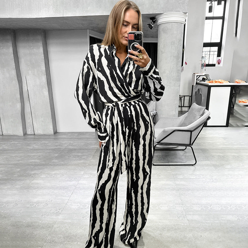 Dame elegant jumpsuit med asymmetrisk krave og sidelænbånd Stilla