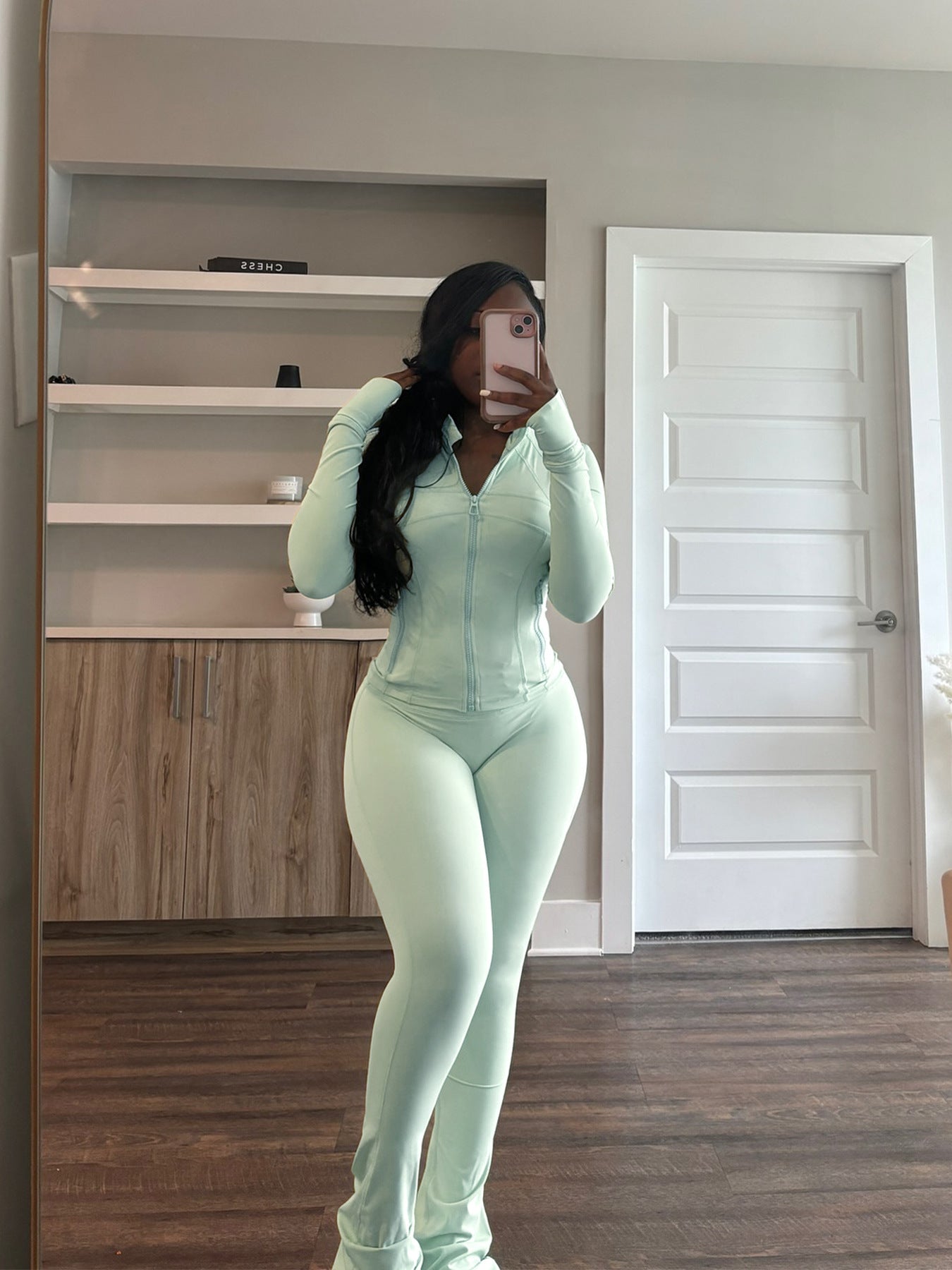 Damer Sporty Langeærmet Jumpsuit i Stretch-materiale med Lynlås Stilla