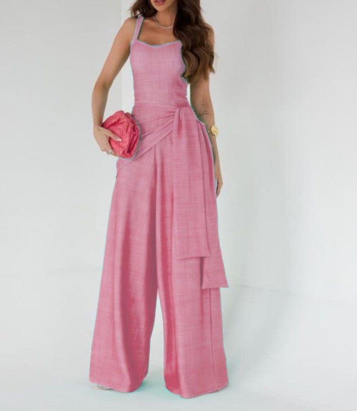 Dame bredt jumpsuit med elegante draperinger og stropper Stilla
