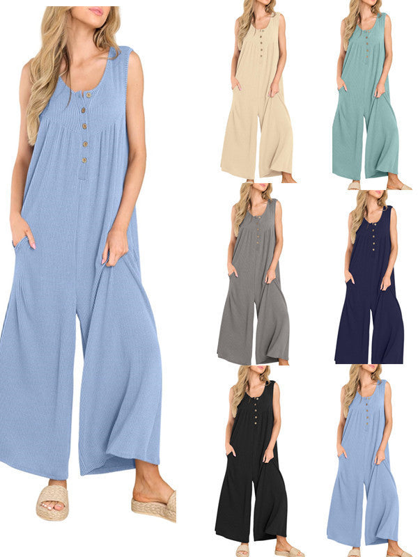 Dame afslappet jumpsuit med vidde ben og knapdetaljer Stilla