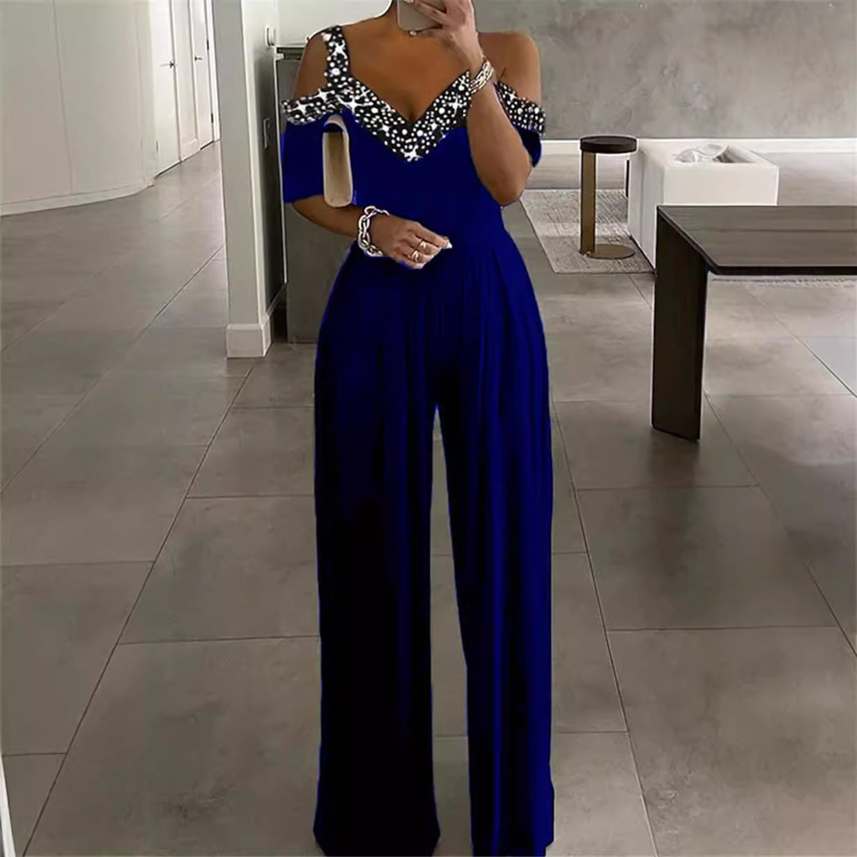 Dame elegant jumpsuit med Off-Shoulder design og sammensnørret talje Stilla