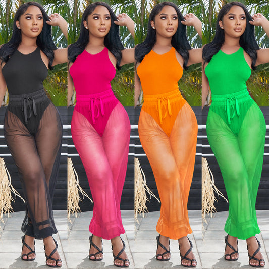 Dame Stilfuld Strand-Jumpsuit med gennemsigtigt design og elastisk talje Stilla