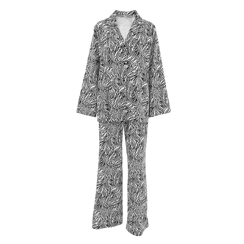 Dame elegant jakkesæt med dyb V-udskæring og zebra-lignende design Stilla