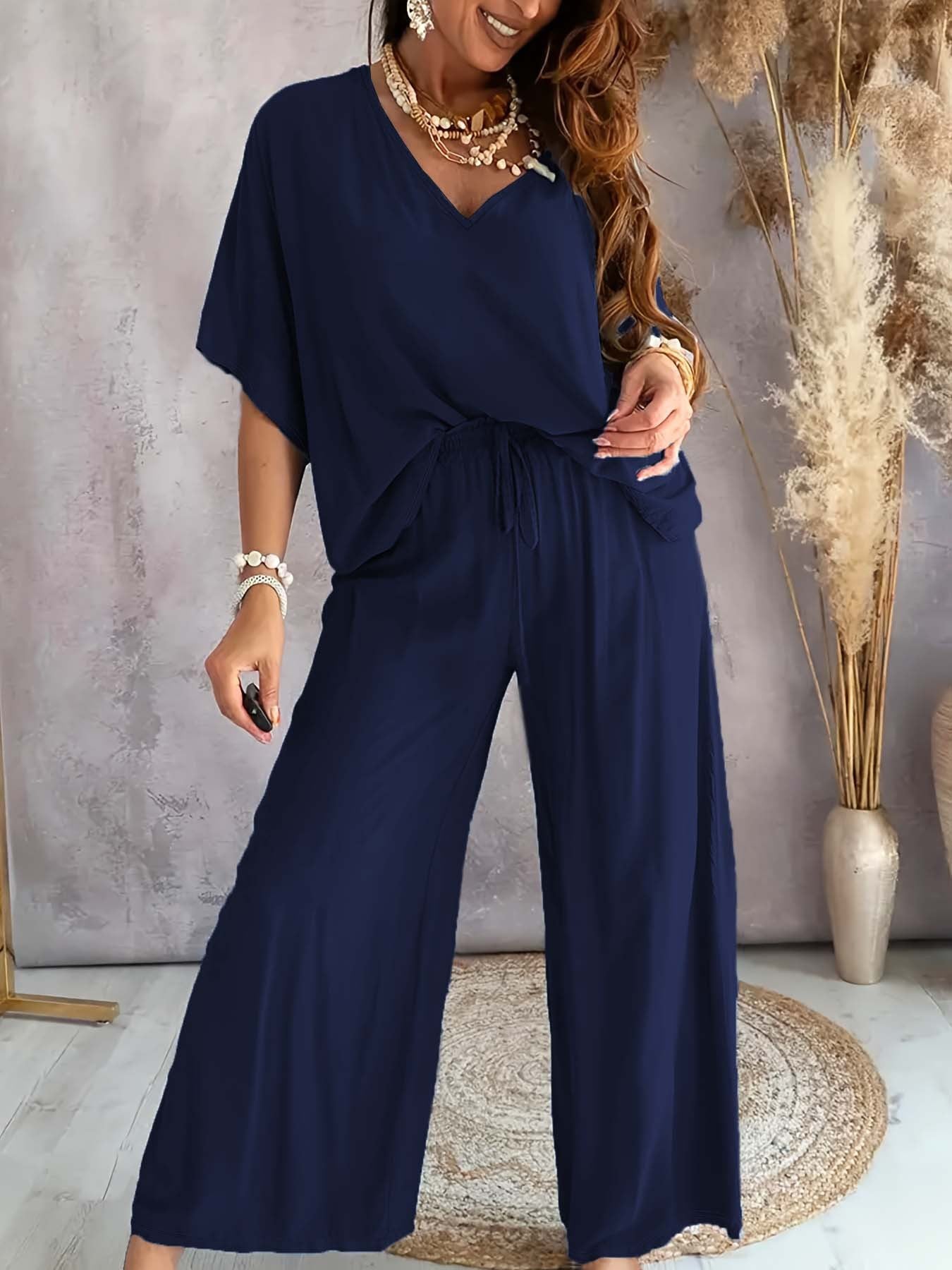Dame afslappet jumpsuit med bred pasform og elastisk talje Stilla