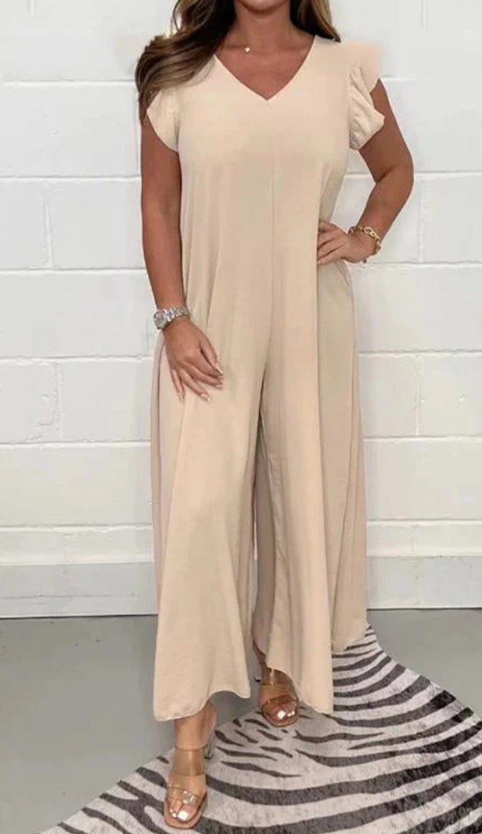 Dame jumpsuit med voluminøse ben og elegant V-udskæring Stilla