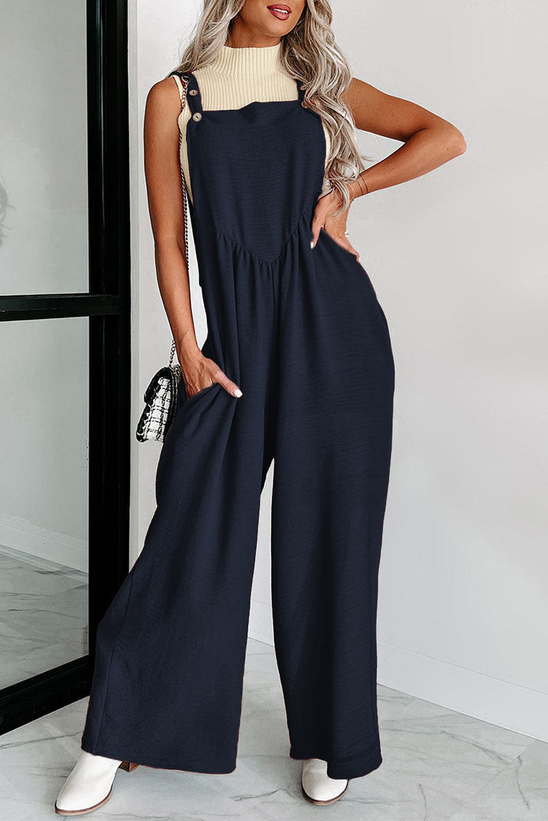 Damer over størrelse jumpsuit med bredt ben og elegante detaljer Stilla