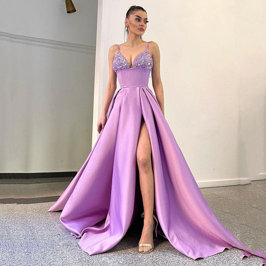 Dame Elegant aftenkjole med skinnende overdel og højt slids Stilla