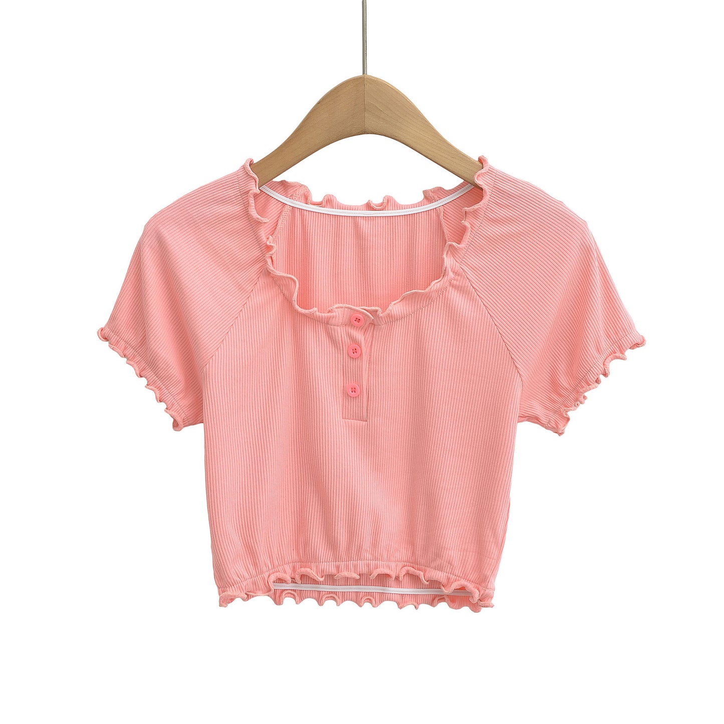 Dame cropped T-shirt med flæsedetaljer og knaplukning Stilla