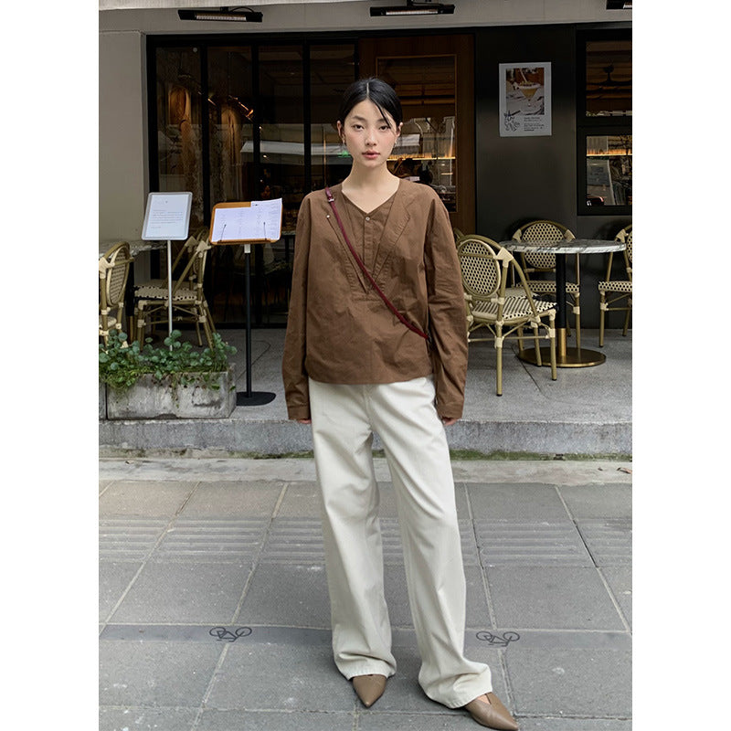 Dame afslappet langærmet skjorte med struktureret udskæring og knapdetaljer Stilla