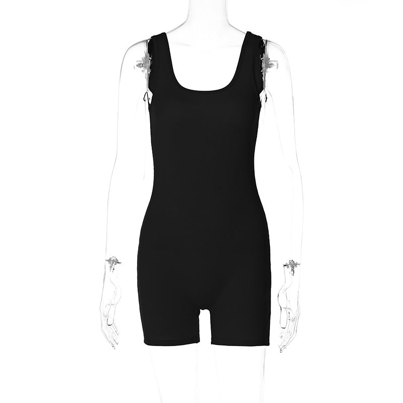 Dame figurbetonet kort jumpsuit med enkel skæring og trendy ribstruktur Stilla
