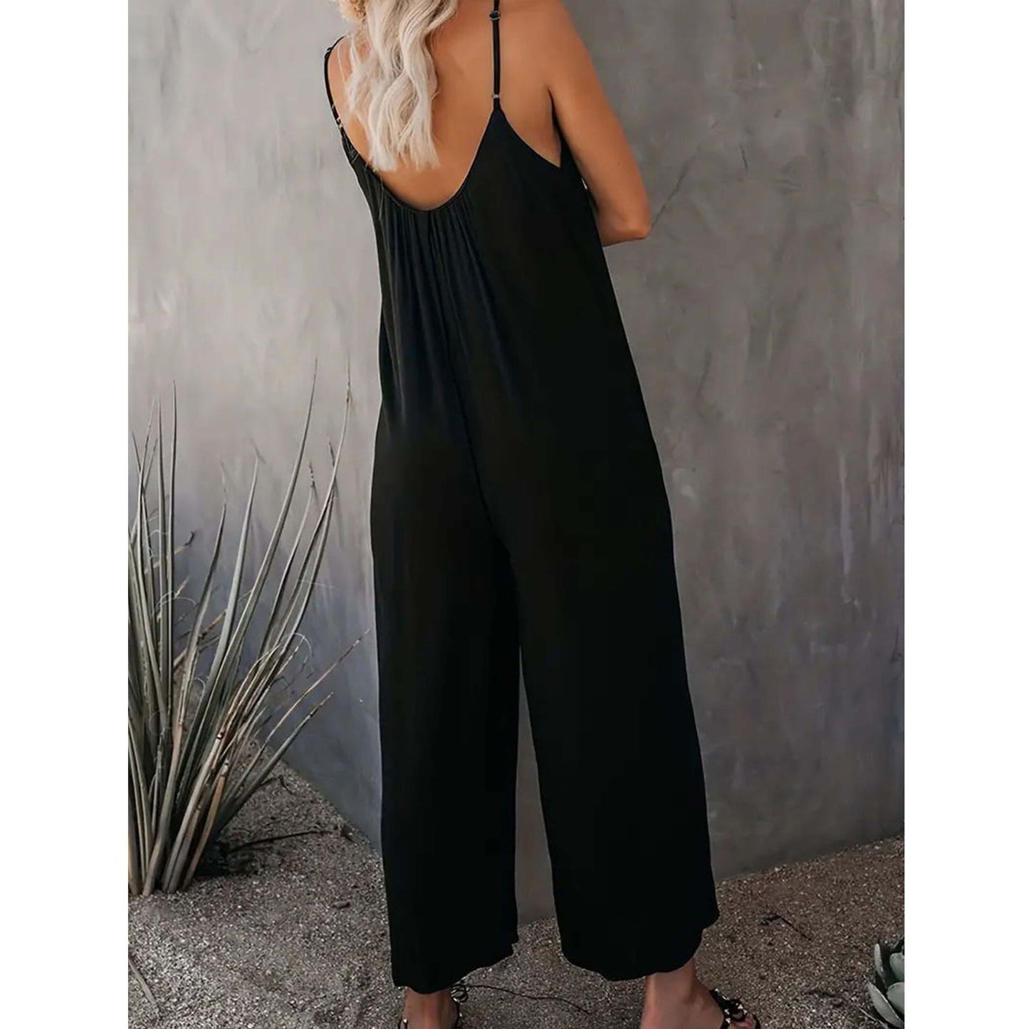Dame jumpsuit med justerbare stropper og motiverende tryk Stilla